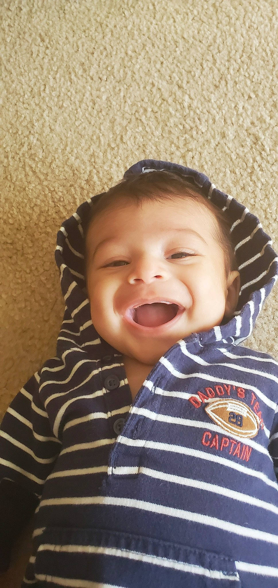 Dean is registered to the contest to win money with this photo: baby, cheek, child, chin, face, facial_expression, happy, head, laugh, mouth, nose, person, skin, smile, toddler, tongue, yawn