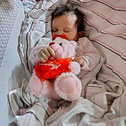 Octavia joined the competition — help win amazing prizes! baby, blanket, butterfly, child, comfort, cozy, crib, cute, indoors, infant, mobile, nap_time, pacifier, peaceful, pink, red, sleeping, soft_toy, striped_blanket, teddy_bear