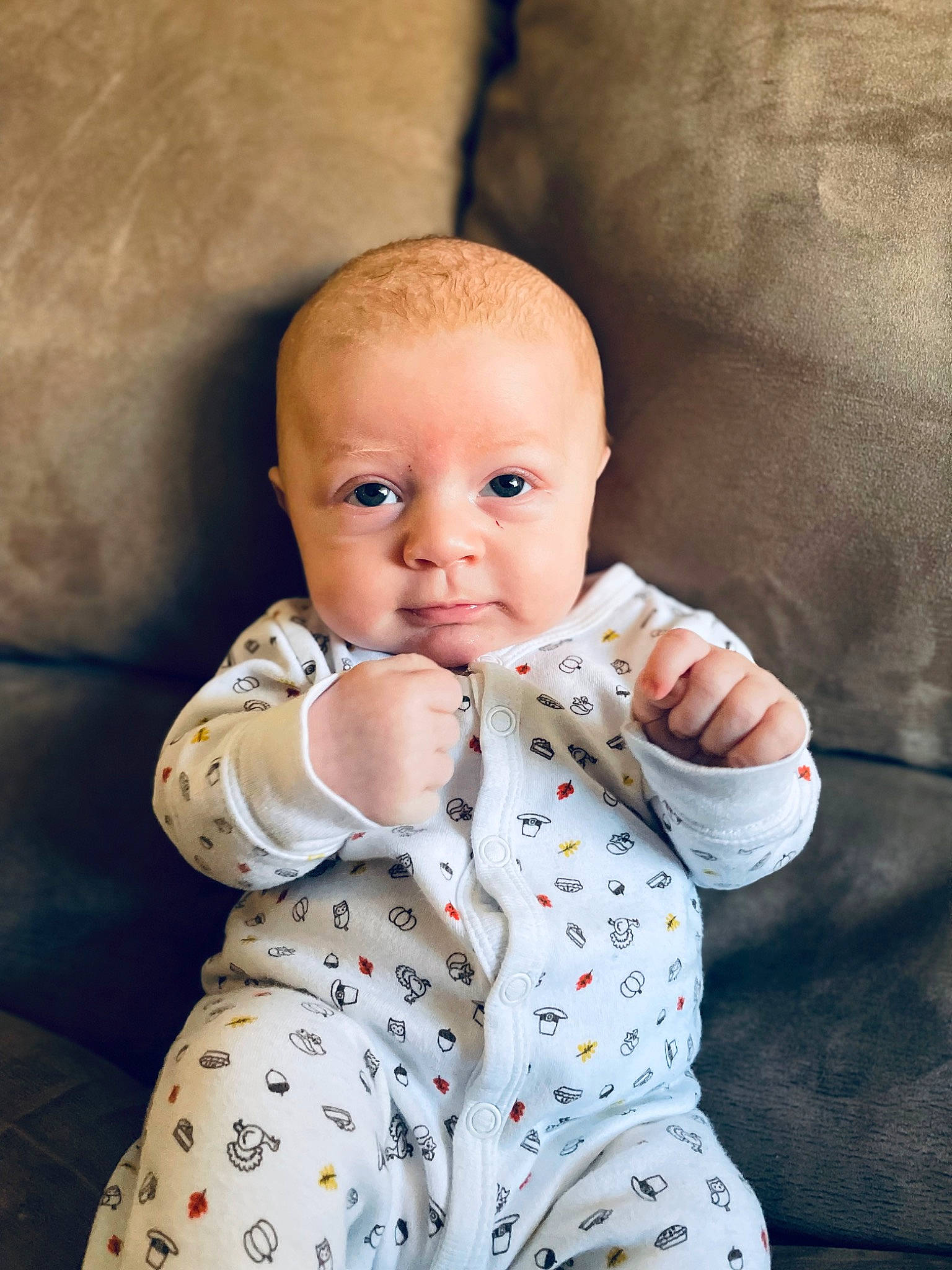 Kaine is registered to the contest to win money with this photo: arm, baby, baby_toddler_clothing, beauty, cheek, child, collar, comfort, eye, face, flash_photography, iris, nose, outerwear, pattern, person, sitting, skin, sleeve, textile