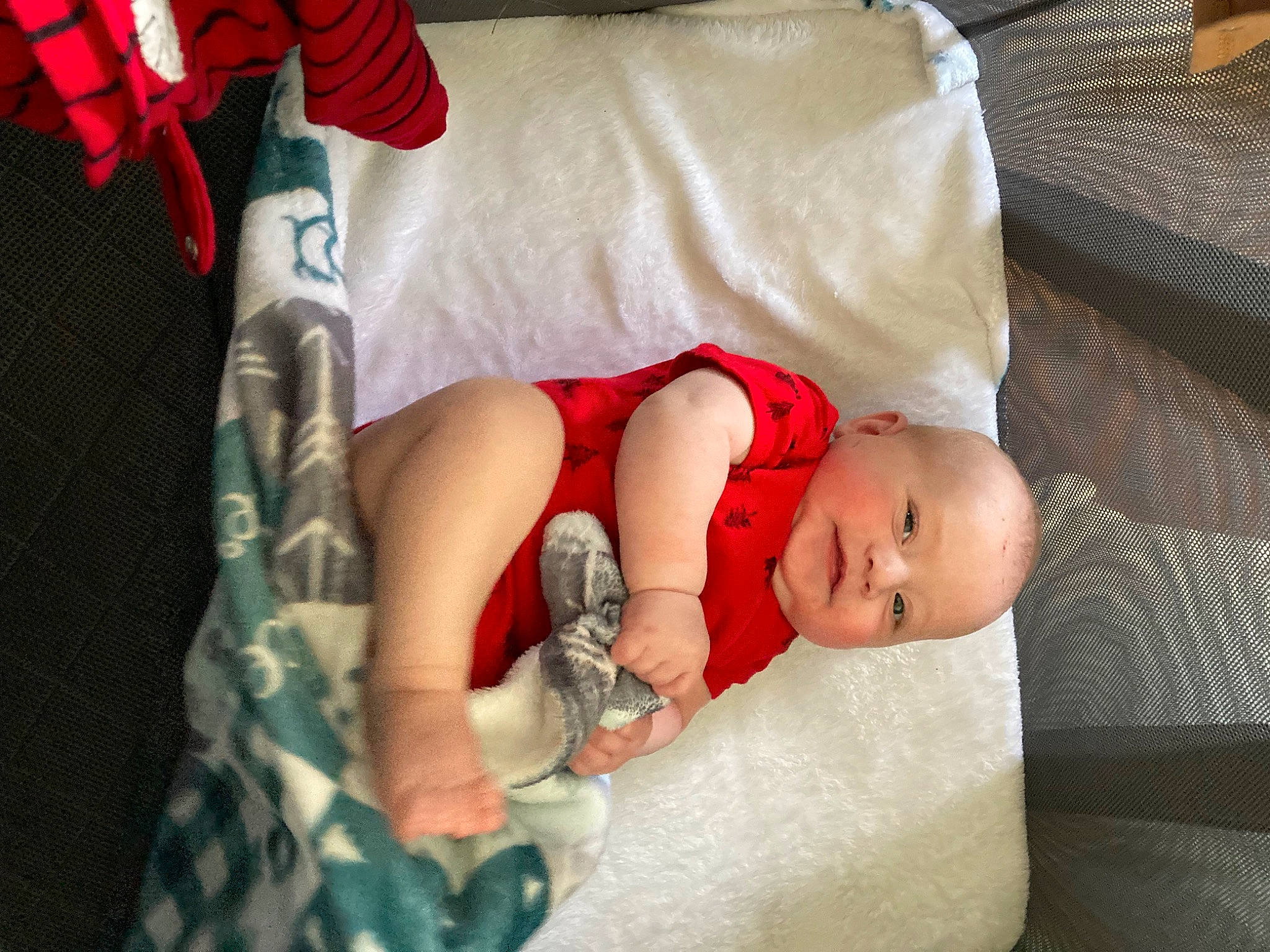 Chayce joined the competition — help win amazing prizes! arm, baby, baby_products, baby_toddler_clothing, child, comfort, finger, hand, human_body, human_leg, leg, linens, person, product, room, sitting, skin, textile, thigh, toddler