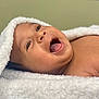 baby, infant, smiling, happy, face, mouth_open, eyes, skin, towel, white, soft_texture, portrait, closeup, cute, newborn, child, expression, lying_down, warm, cozy