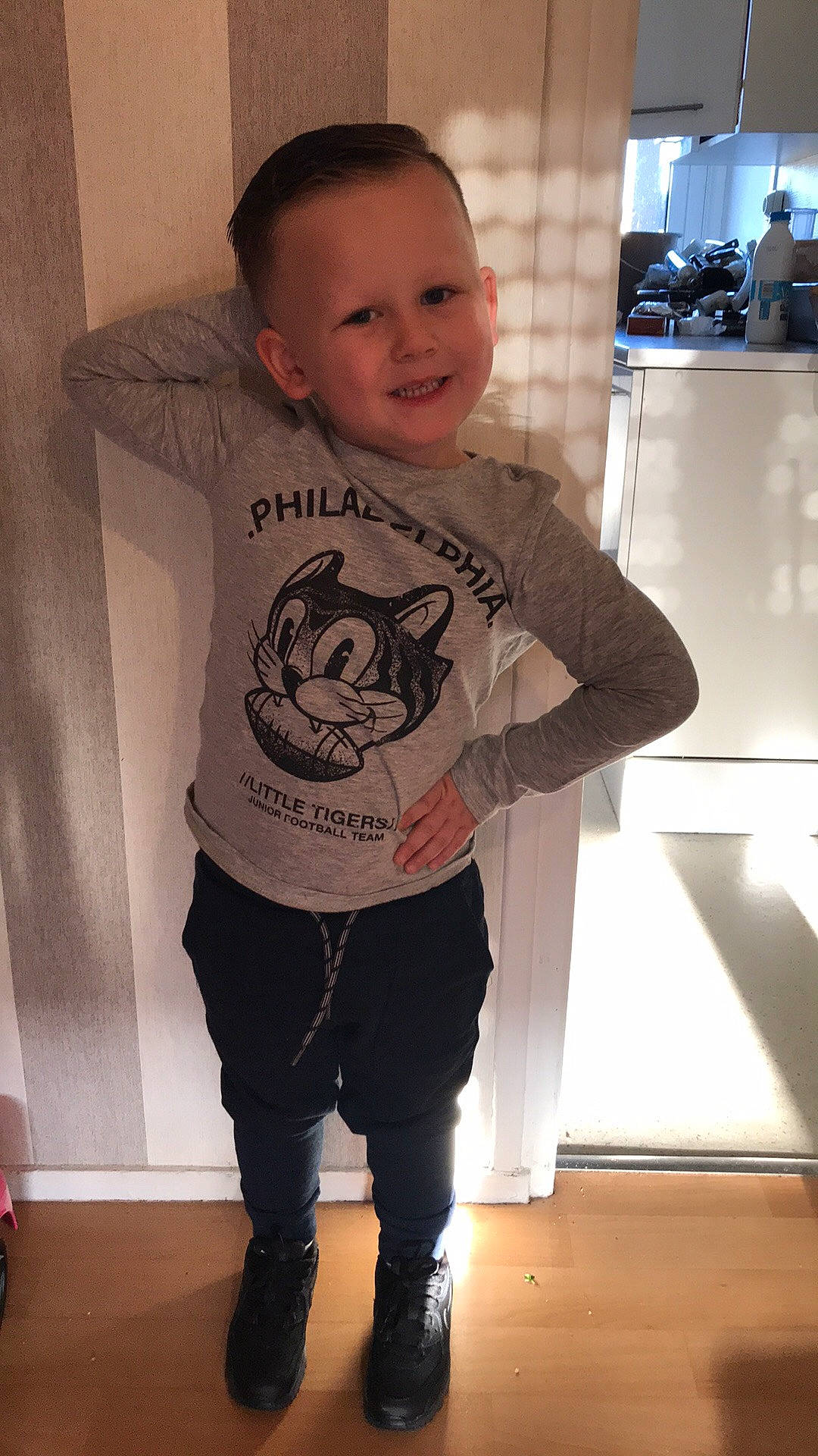 Thiago participe au concours pour gagner de l'argent avec cette photo : child, clothing, cool, footwear, jeans, joy, outerwear, person, shirt, sleeve, standing, t_shirt, toddler, top