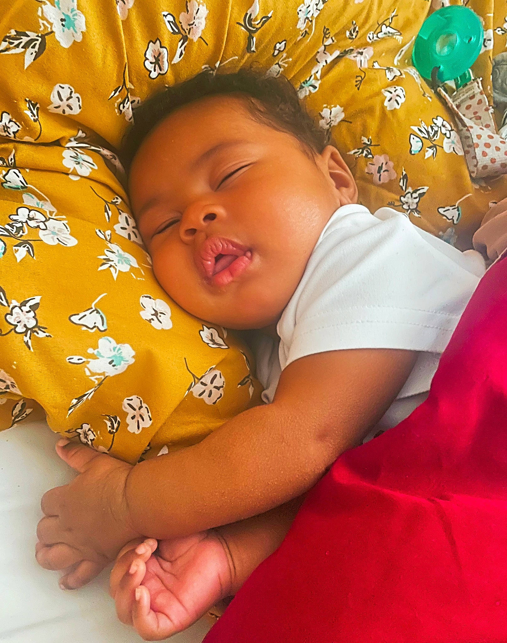 Teigan is registered to the contest to win money with this photo: adaptation, baby, baby_sleeping, baby_toddler_clothing, child, comfort, facial_expression, finger, fun, gesture, happy, nail, pattern, people_in_nature, person, pink, product, skin, textile, thumb