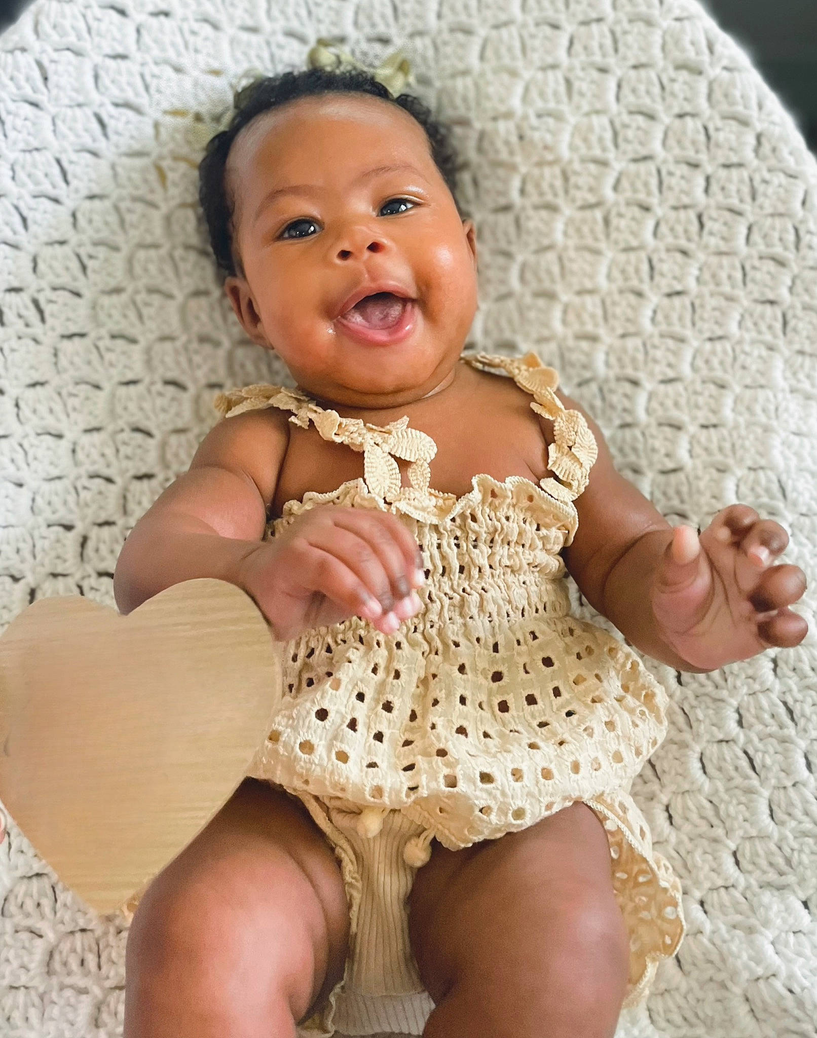Teigan joined the competition — help win amazing prizes! abdomen, baby, baby_toddler_clothing, chest, child, embellishment, eyelash, face, happy, headgear, human_leg, iris, leg, organ, person, sitting, skin, thigh, toddler, trunk