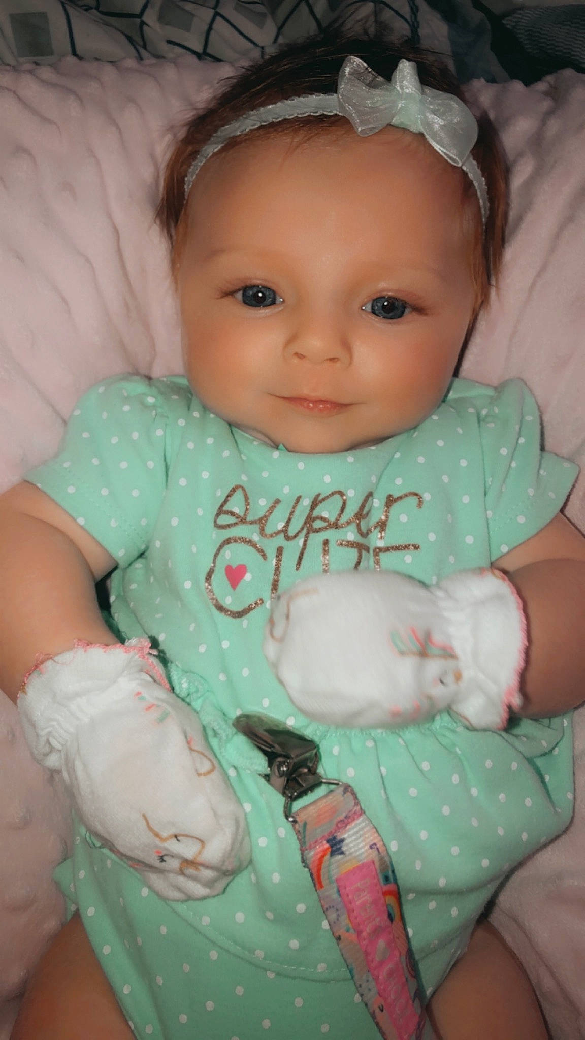 Skylar joined the competition — help win amazing prizes! baby, baby_products, baby_toddler_clothing, cheek, child, comfort, eye, eyelash, face, finger, hand, happy, head, iris, organ, person, pink, skin, sleeve, smile