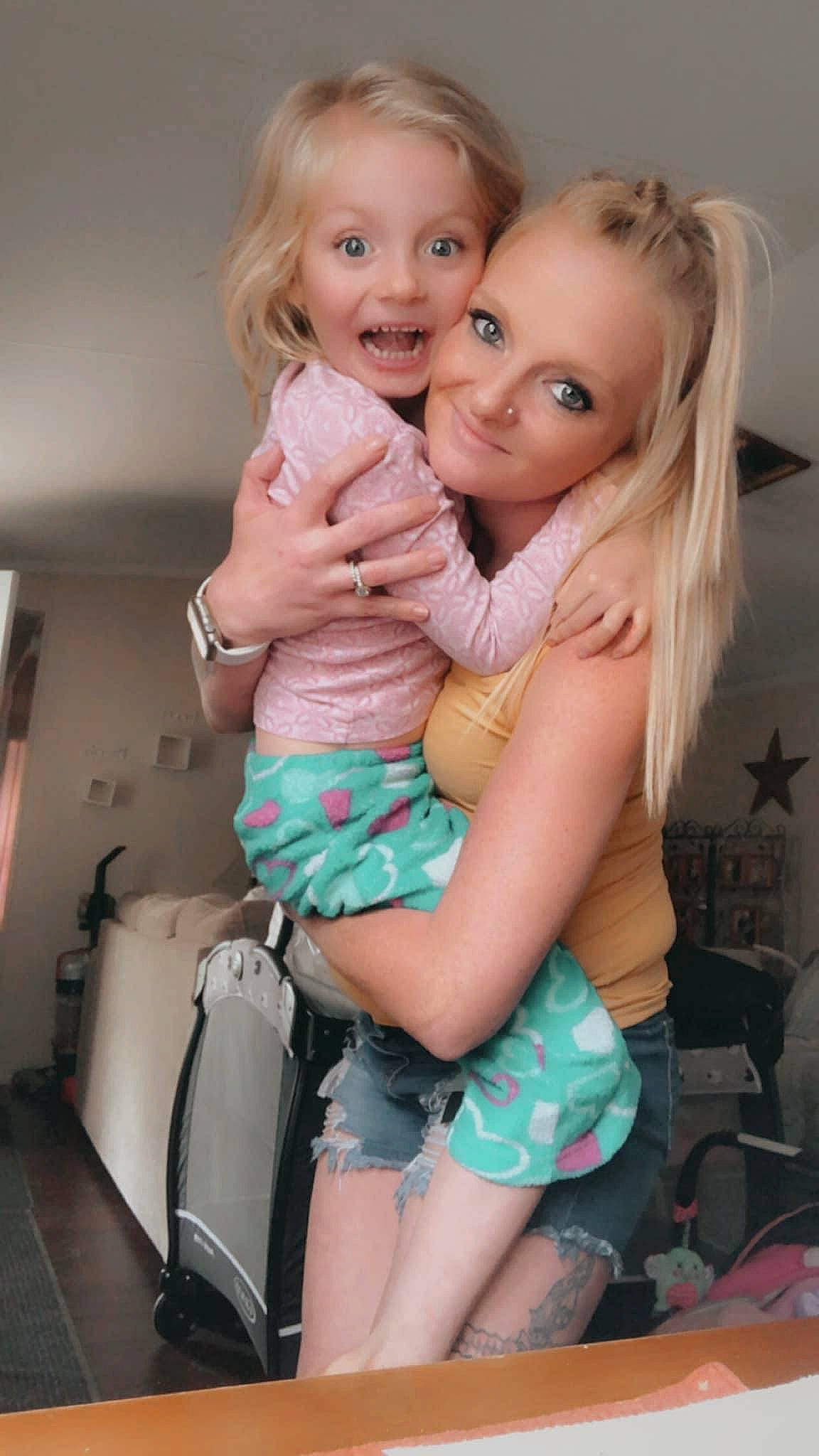 Macy joined the competition — help win amazing prizes! eye, face, facial_expression, gesture, hair, happy, head, iris, joint, joy, lip, mouth, muscle, organ, person, pink, shorts, shoulder, skin, smile