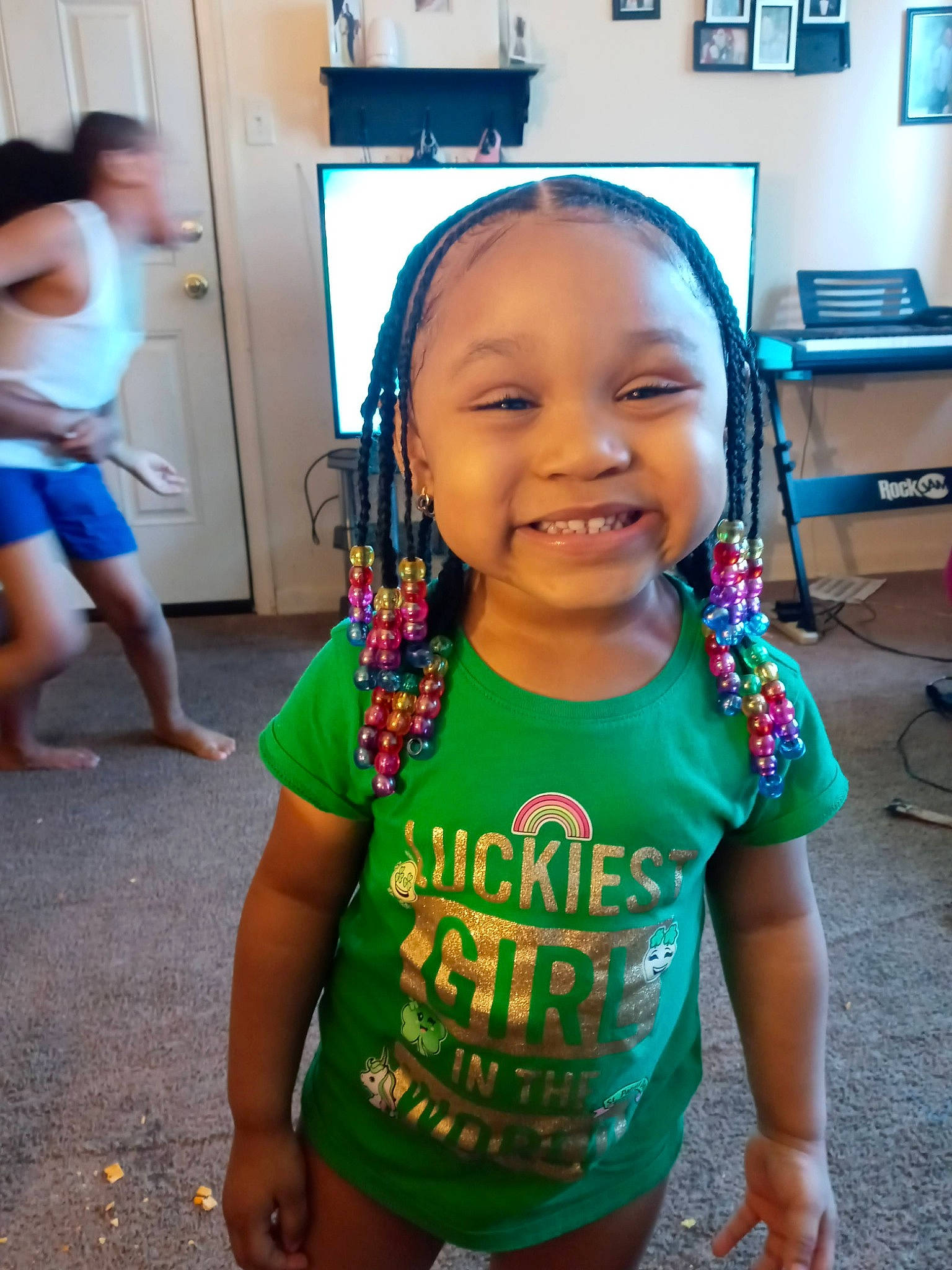 Charli is registered to the contest to win money with this photo: arm, child, chin, cool, event, facial_expression, fun, happy, joy, leisure, person, picture_frame, selfie, shorts, shoulder, skin, sleeve, smile, t_shirt, television