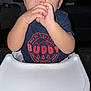 Stephen joined the competition — help win amazing prizes! baby, child, high_chair, indoor, curtains, window, shirt, hands, face, eyes, person, furniture, table, infant, cute, expression, sitting, young_child, home, dark_background