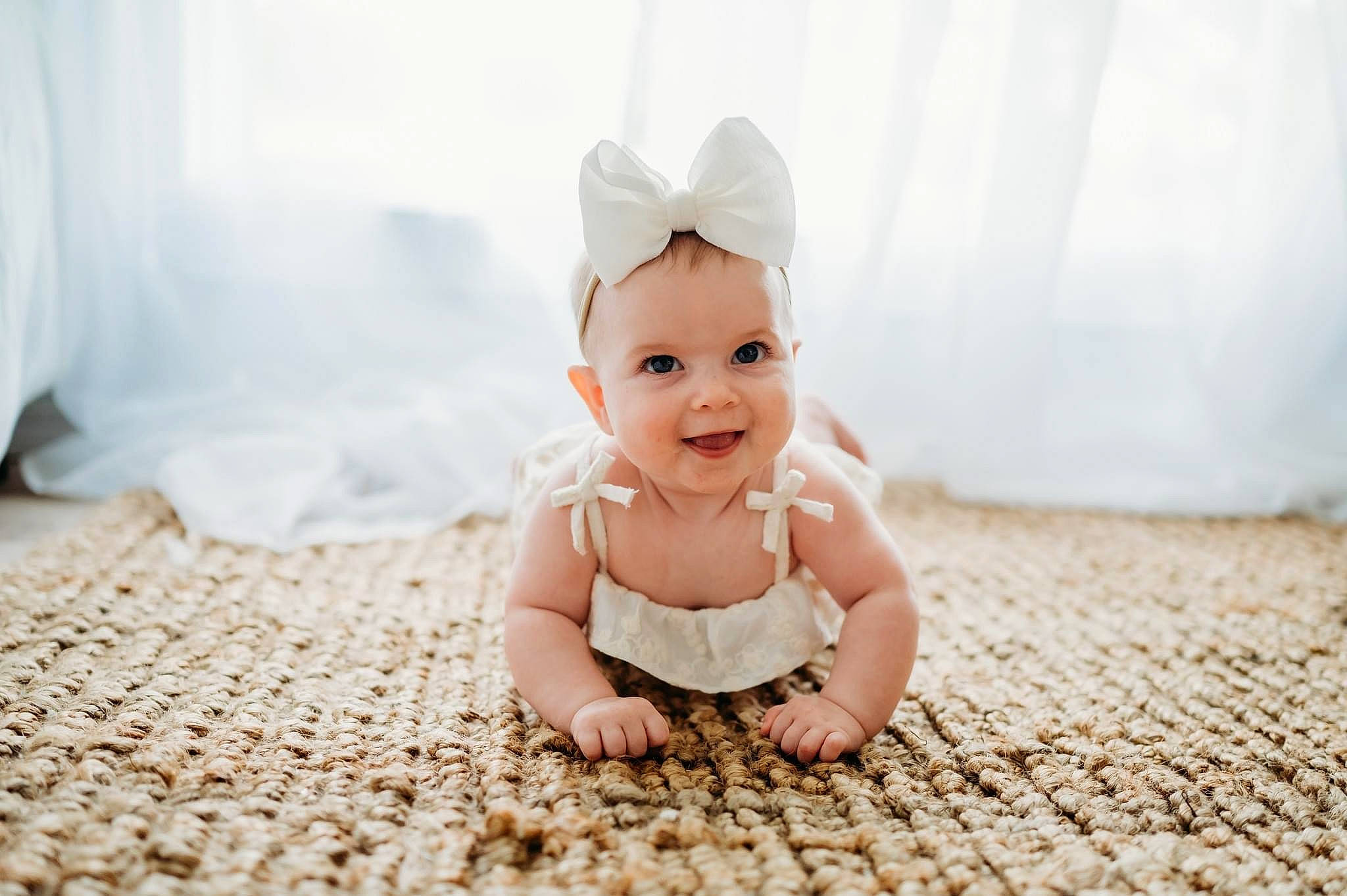Leighton joined the competition — help win amazing prizes! baby, baby_toddler_clothing, child, eye, fashion_accessory, flash_photography, floor, flooring, grass, happy, head, headpiece, human_body, iris, joy, people_in_nature, person, petal, skin, smile
