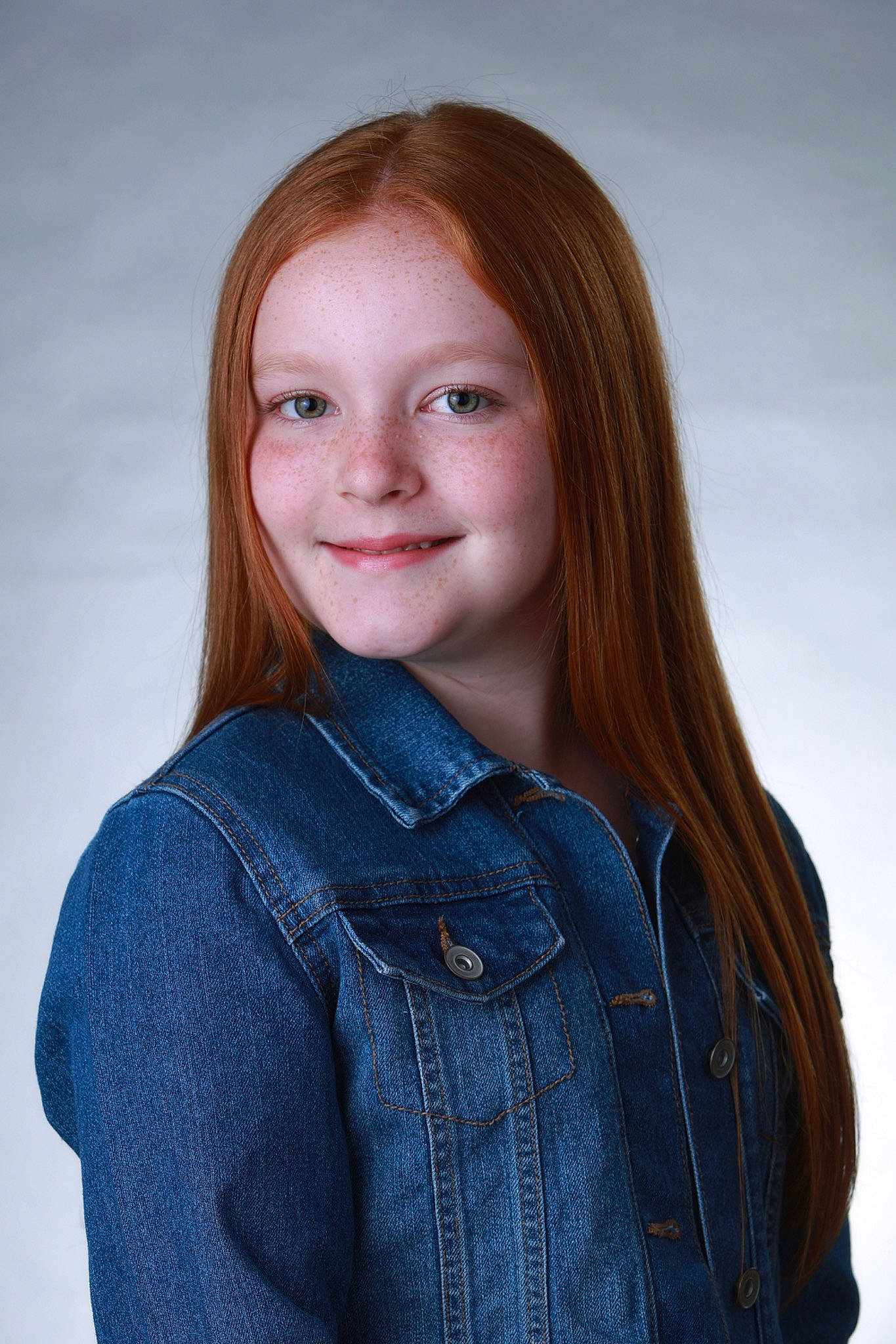 Hannah is registered to the contest to win money with this photo: arm, cheek, collar, denim, electric_blue, eye, eyebrow, eyelash, face, flash_photography, happy, head, iris, joy, lip, neck, outerwear, person, skin, sleeve