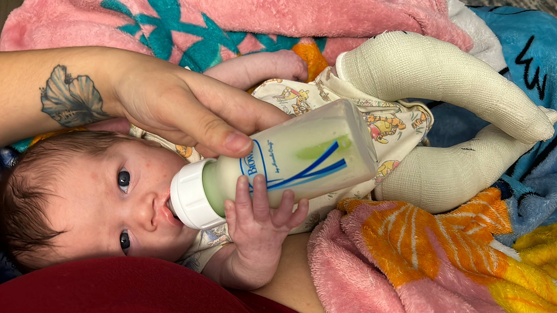 Jorge is registered to the contest to win money with this photo: baby, baby_bottle, baby_products, bottle, drink, drinking, drinkware, eyelash, finger, gesture, hand, happy, infant_formula, nail, person, plant_milk, plastic_bottle, skin, thumb, toddler