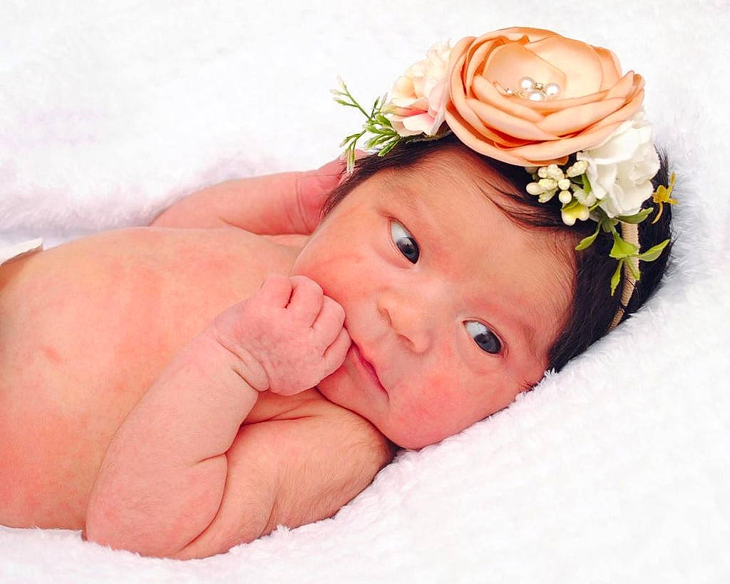 Kiran joined the competition — help win amazing prizes! baby, baby_toddler_clothing, cap, child, comfort, eyebrow, finger, flower, hand, happy, headband, headgear, headpiece, headwear, jewellery, nail, person, petal, pink, rose