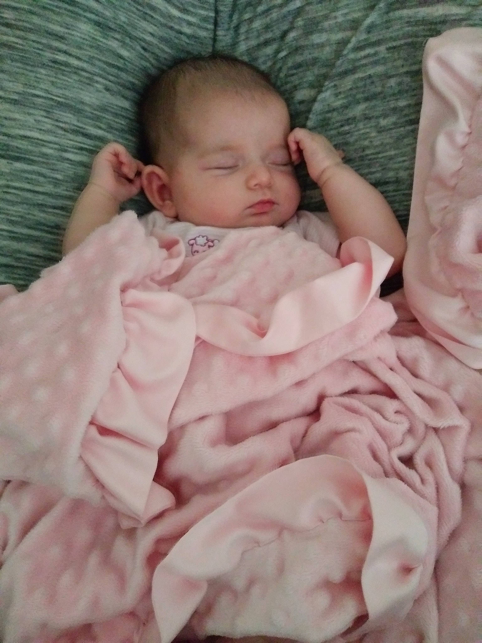 Stella is registered to the contest to win money with this photo: baby, bedding, bedtime, blanket, cheek, child, linens, nose, person, pink, skin, sleep, textile, toddler