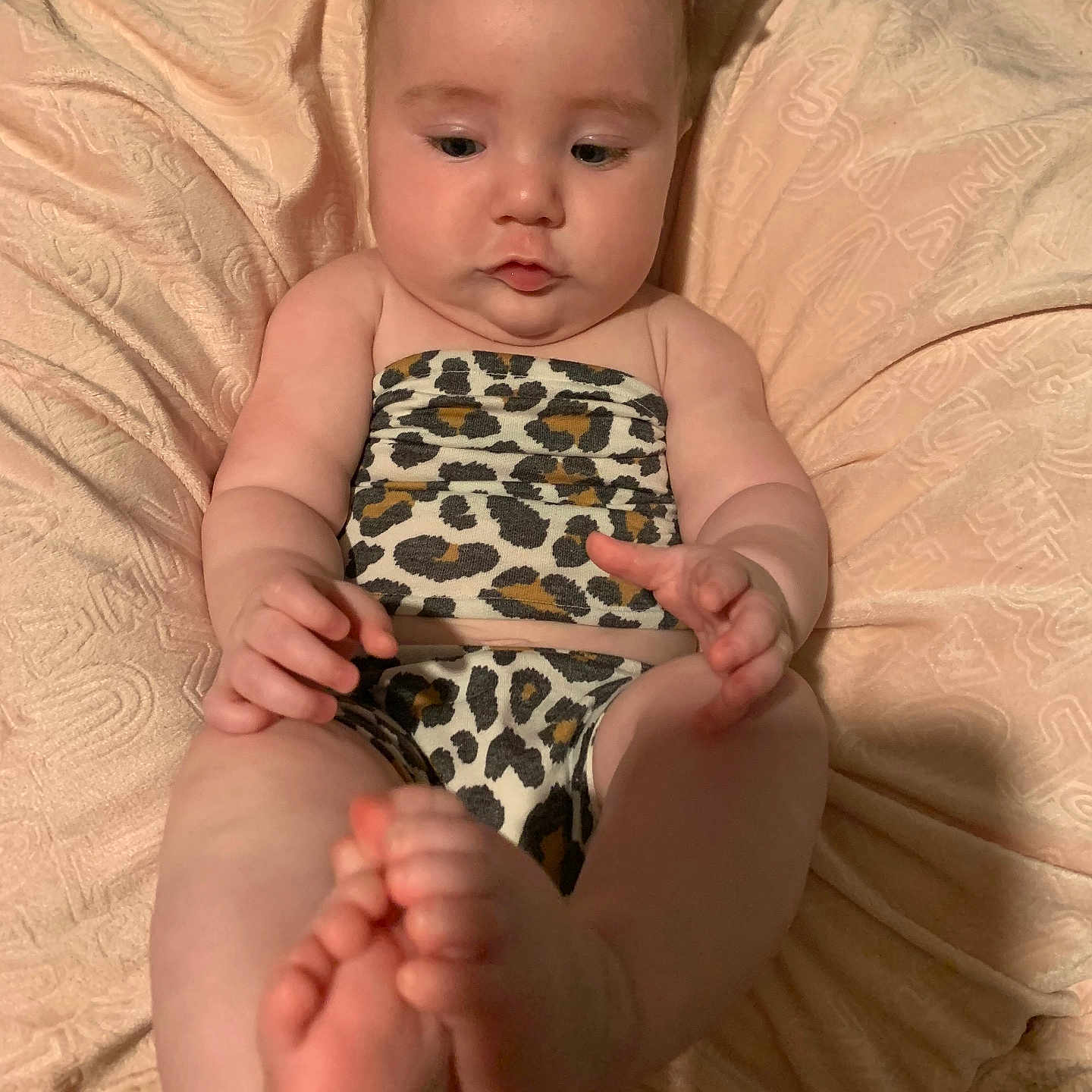 Mia joined the competition — help win amazing prizes! baby, bed, bodypart, clothing, couch, cushion, dress, face, finger, furniture, hand, head, homedecor, indoors, newborn, person, photography, portrait, quilt, sitting