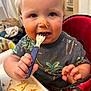 toddler, child, spaghetti, fork, messy, food, high_chair, face, noodle, eating, meal, clothing, blue_eyes, blond_hair, indoor, kitchen, cute, hands, plate, baby