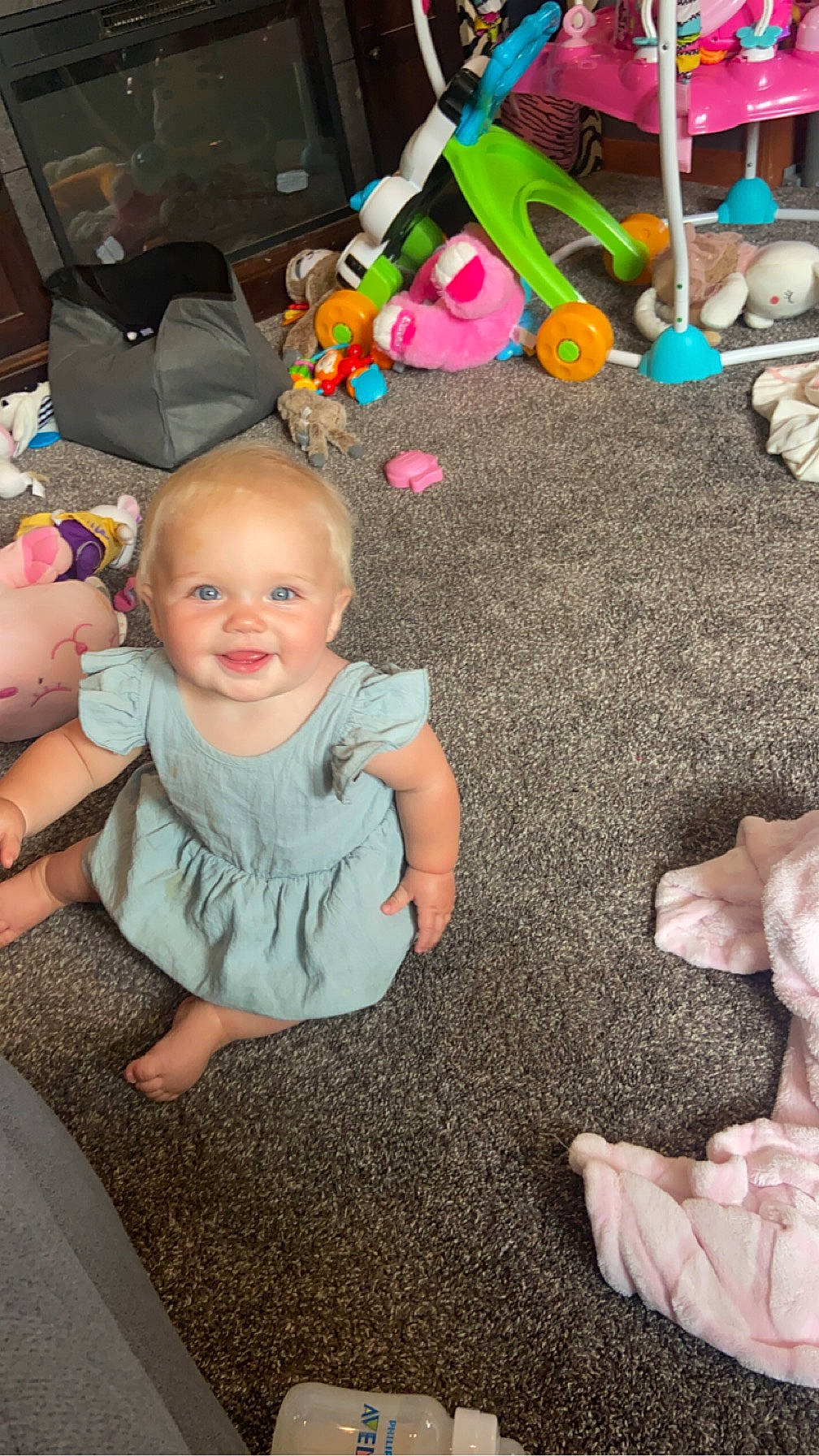 Bailey joined the competition — help win amazing prizes! baby, baby_toddler_clothing, child, event, flooring, foot, fun, gesture, happy, human_leg, joy, people, person, photograph, play, sitting, smile, snapshot, stuffed_toy, thumb