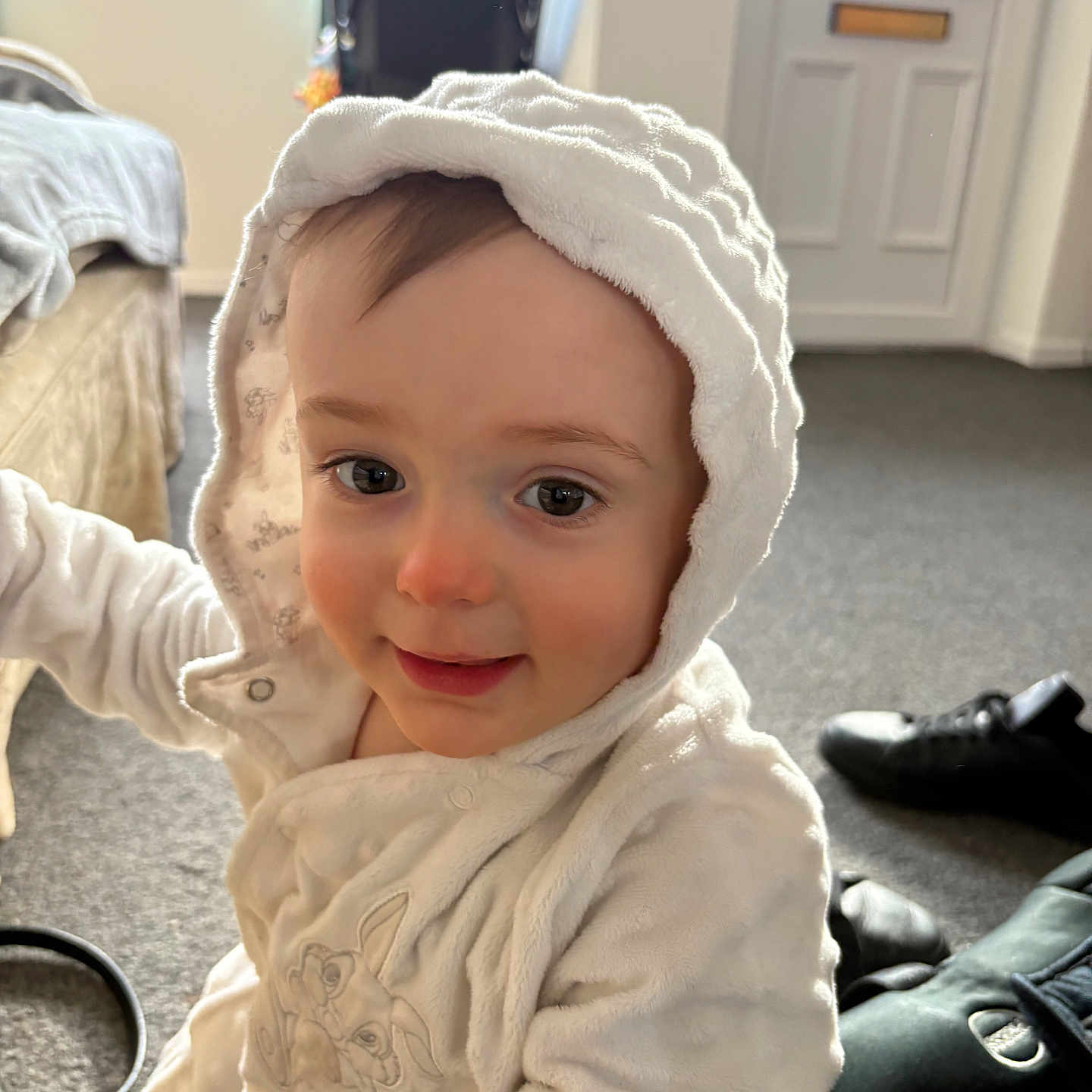 Arameus joined the competition — help win amazing prizes! baby, carpet, child, cozy, curious, cute, expression, face, home, hood, indoor, person, portrait, shoes, smile, stroller, toddler, warm_clothing, white_jacket, young_child