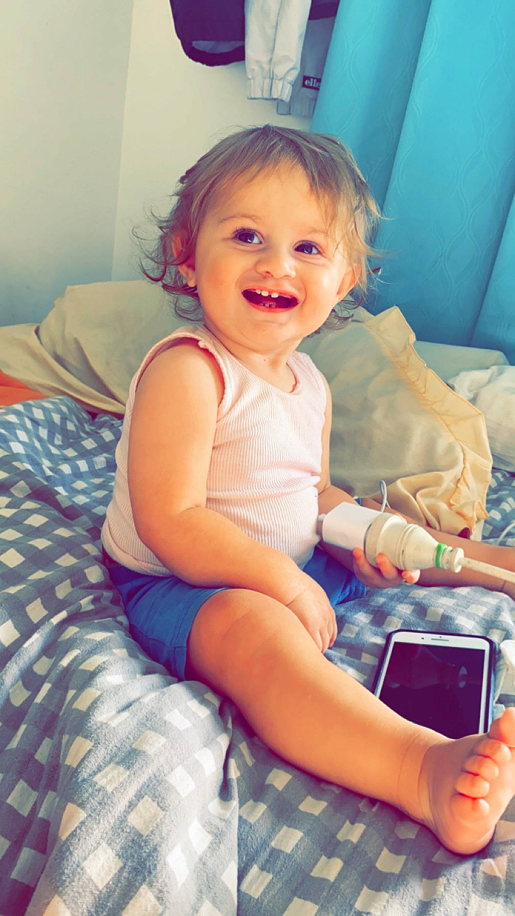 Elijah joined the competition — help win amazing prizes! arm, baby_toddler_clothing, blue, comfort, finger, hairstyle, hand, happy, human_body, iris, joy, lap, mobile_phone, mouth, muscle, person, photograph, skin, smile, thigh