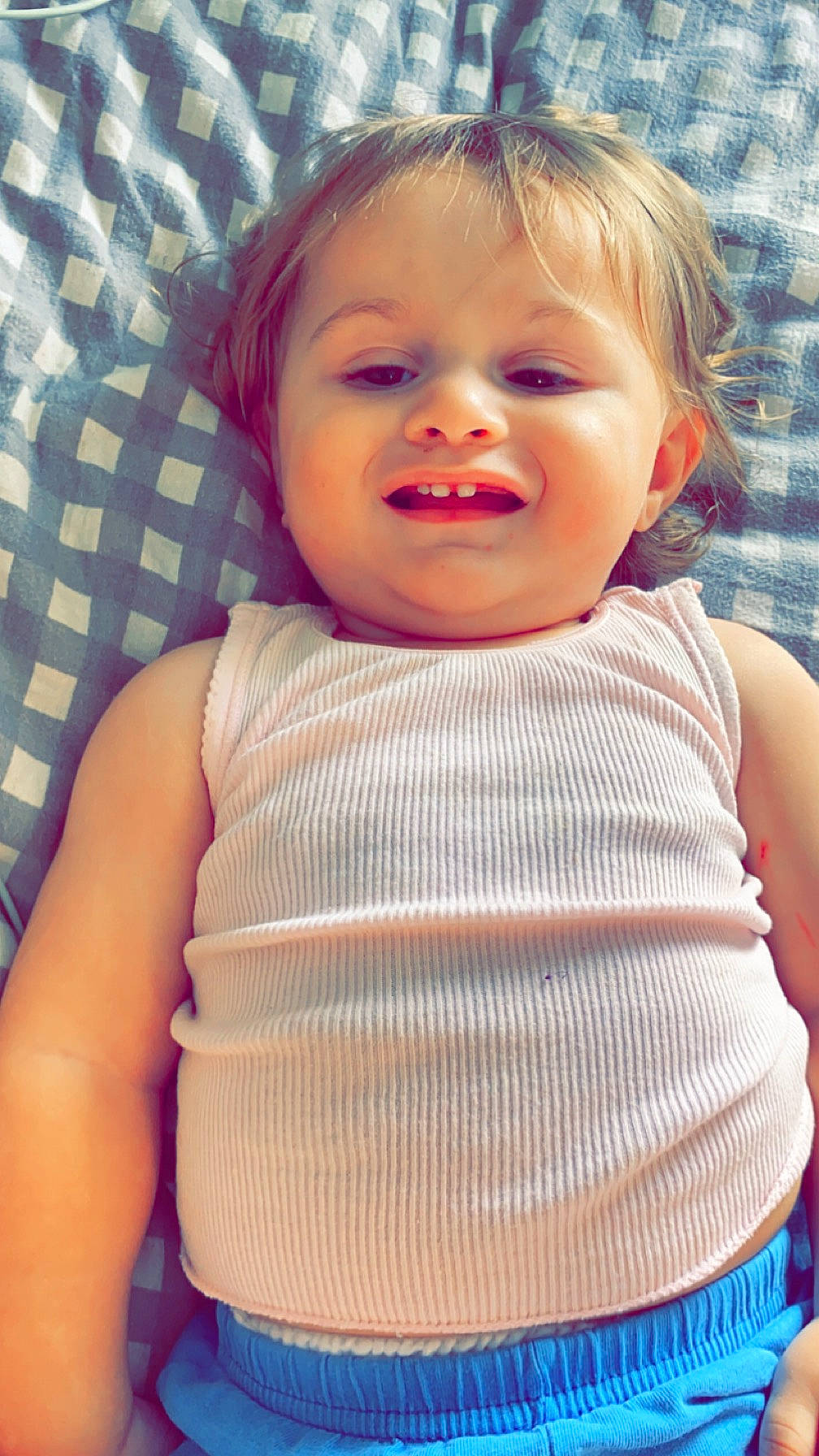 Elijah is registered to the contest to win money with this photo: baby, baby_toddler_clothing, blue, cheek, chest, eye, eyelash, face, happy, human_body, iris, lip, mouth, neck, nose, person, skin, sleeve, smile, textile