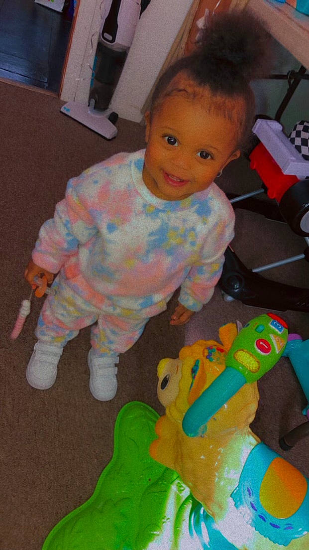 Kennedy is registered to the contest to win money with this photo: baby, baby_playing_with_toys, baby_products, baby_toddler_clothing, baby_toys, cheek, child, finger, flooring, fun, head, joy, mouth, nose, person, room, sitting, skin, smile, toddler