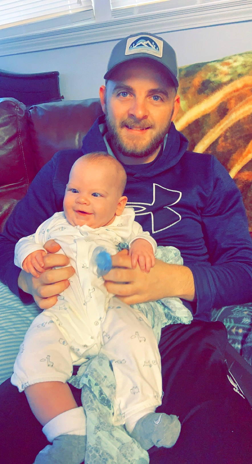 Braiden joined the competition — help win amazing prizes! baby, baby_toddler_clothing, beard, blue, cool, eye, face, facial_expression, happy, hat, head, headwear, human_body, interaction, joy, lap, mouth, muscle, organ, person