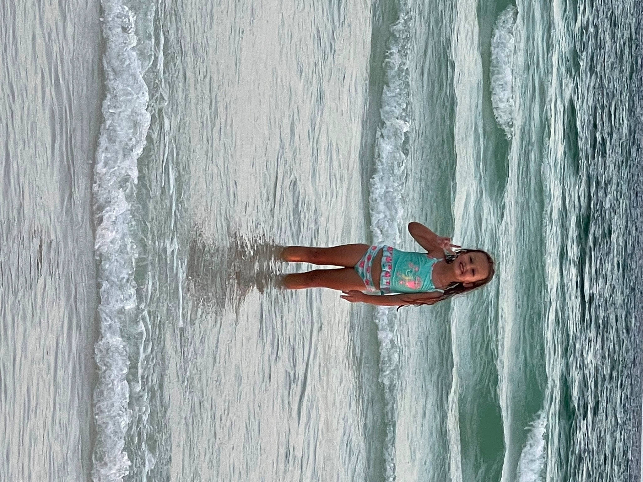 Blake is registered to the contest to win money with this photo: azure, beach, body_of_water, coast, elbow, fun, grey, joy, lake, leisure, ocean, person, recreation, sky, thigh, tree, vacation, waist, water, wave