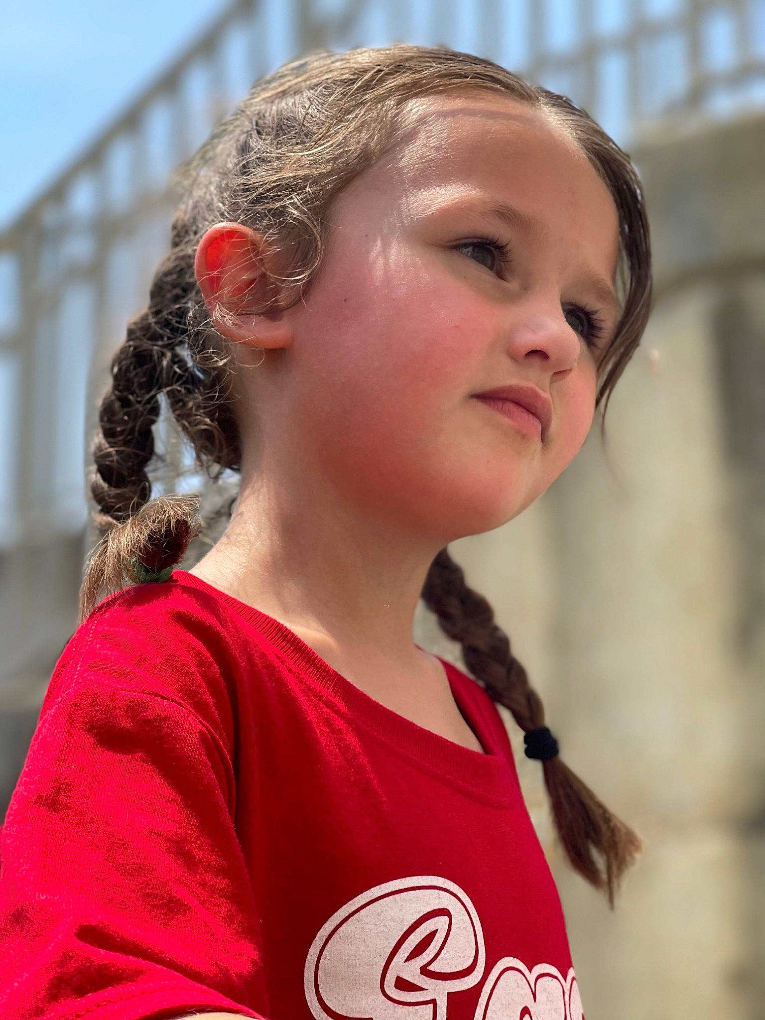 Blake is registered to the contest to win money with this photo: audio_equipment, beauty, blond, brown_hair, child, chin, earrings, eyewear, face, fun, hair_coloring, happy, jewellery, leisure, lip, long_hair, neck, person, sky, t_shirt