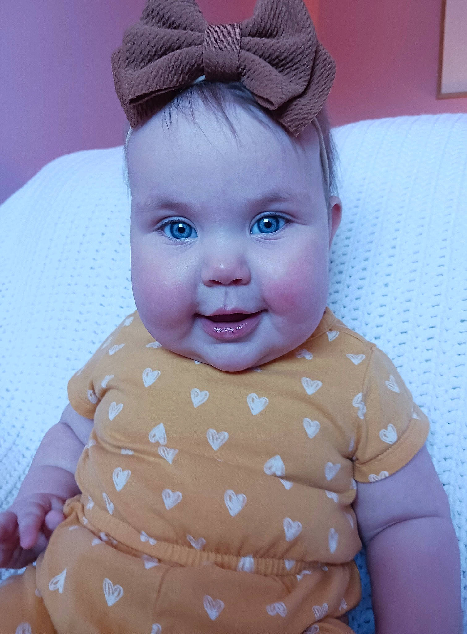 Aubrie joined the competition — help win amazing prizes! baby, baby_toddler_clothing, cap, cheek, child, chin, costume_hat, electric_blue, eyelash, face, fashion_accessory, happy, lip, pattern, person, pink, skin, sleeve, smile, toddler