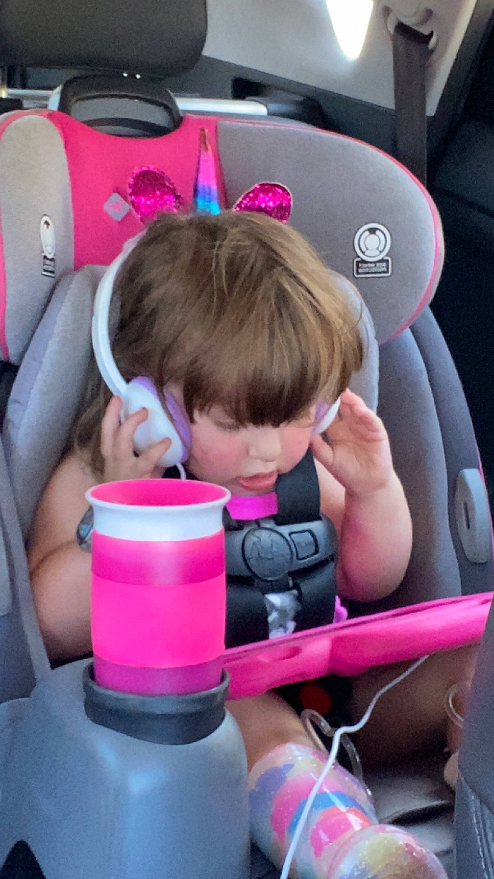 Raelynn joined the competition — help win amazing prizes! audio_equipment, auto_part, automotive_tire, automotive_wheel_system, baby_products, car_seat, child, comfort, eyelash, fun, happy, leisure, magenta, person, personal_protective_equipment, pink, recreation, service, skin, steering_wheel