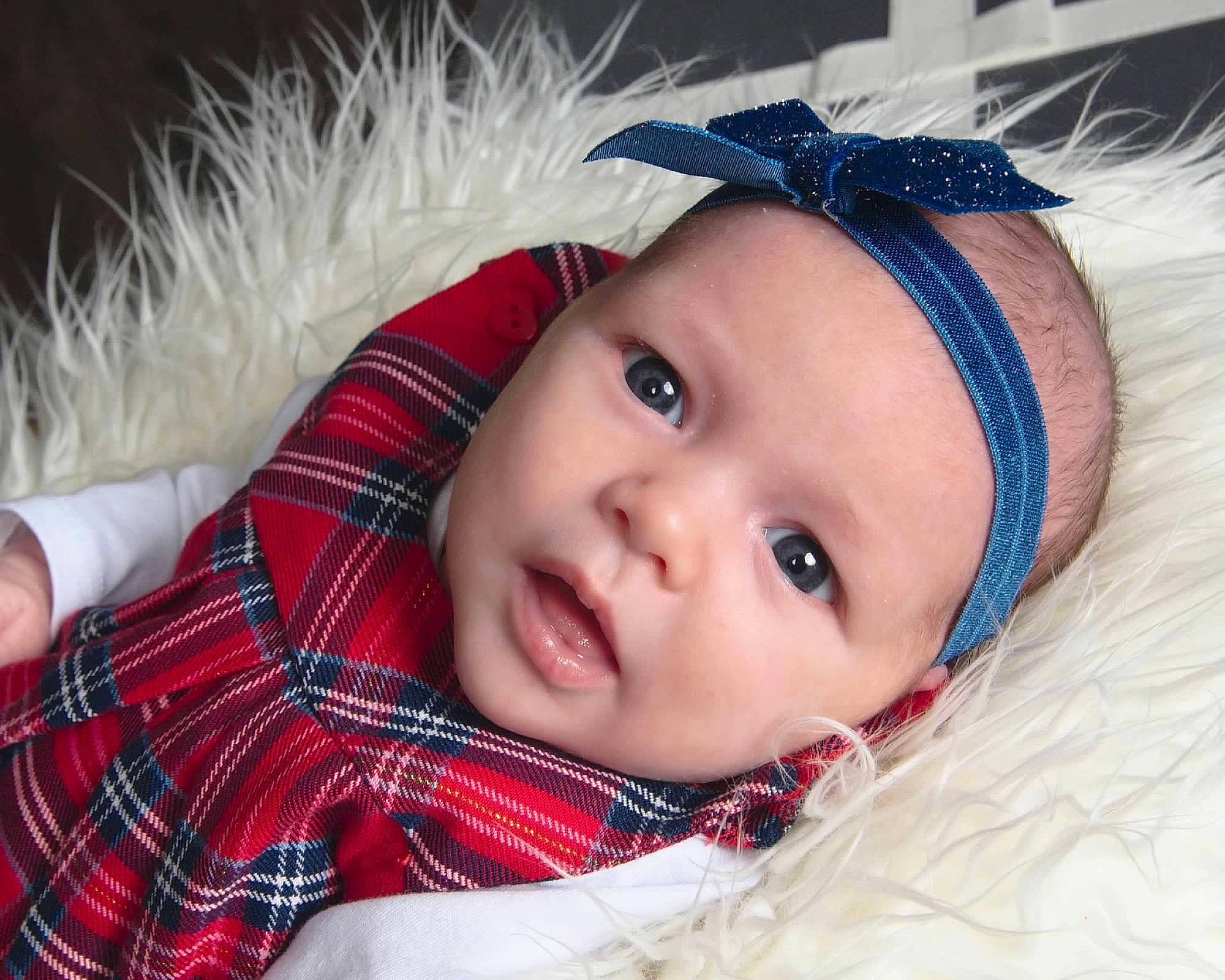 Allisonjoy is registered to the contest to win money with this photo: baby, beauty, cheek, child, close_up, design, ear, eye, face, hair_accessory, head, headgear, headwear, iris, lip, nose, pattern, person, photography, plaid