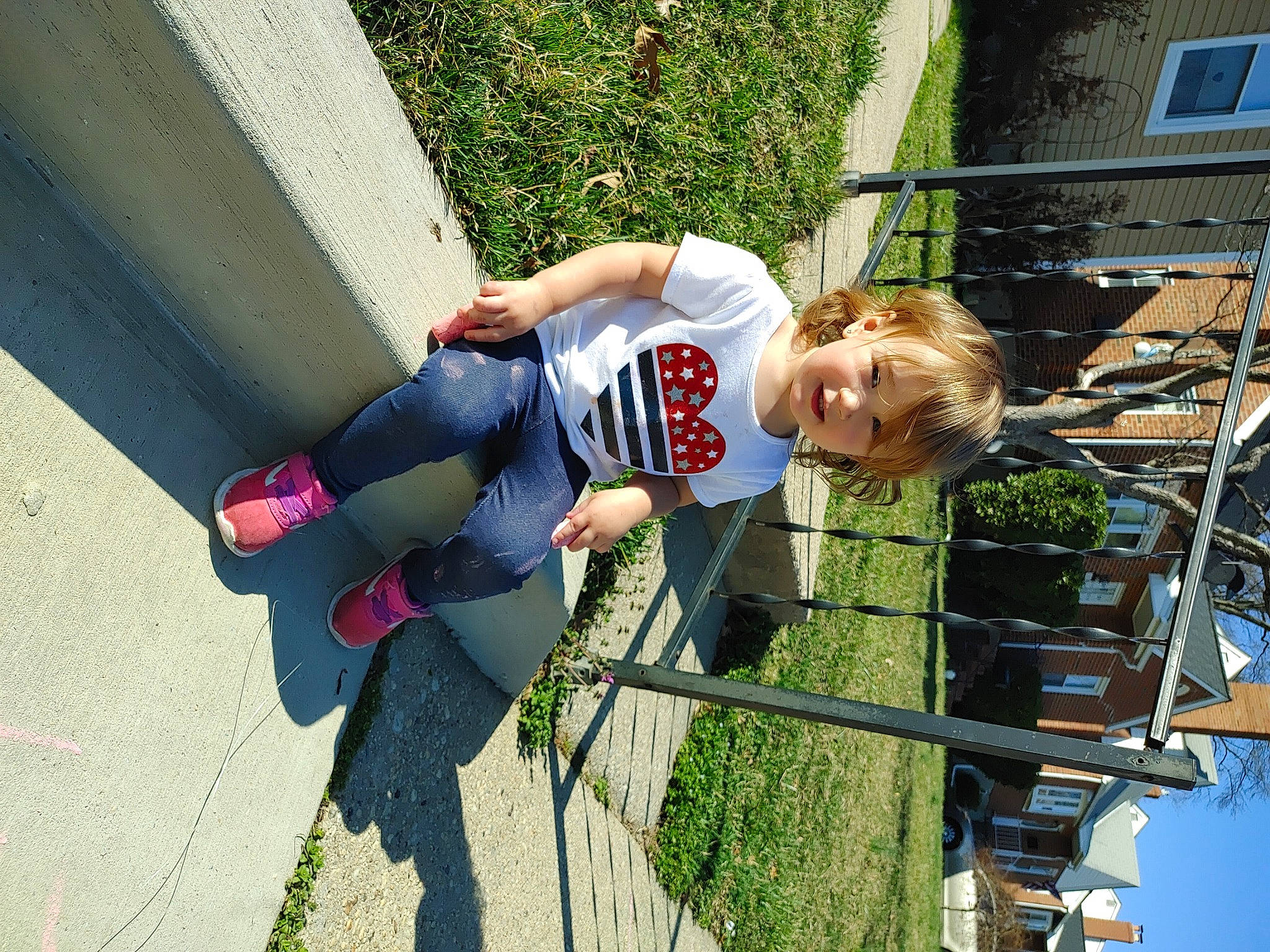 Katrina is registered to the contest to win money with this photo: adventure, child, denim, elbow, fun, grass, happy, human_leg, knee, leisure, outdoor_shoe, person, plant, recreation, smile, t_shirt, thigh, toddler, tree, walking_shoe