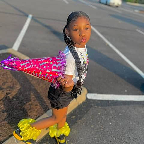 Desire is registered to the contest to win money with this photo: asphalt, event, eyewear, face, fashion_accessory, fun, happy, human_leg, leisure, pedestrian, person, recreation, road, road_surface, running, sandal, sidewalk, smile, street, thigh