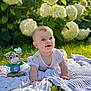 baby, toy, blanket, grass, flowers, sunlight, smile, outdoor, child, nature, greenery, cute, infant, play, happy, summer, garden, toddler, face, clothing