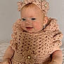 baby, crochet, headband, smiling, infant, dress, handmade, cute, portrait, child, soft_light, indoors, happy, fashion, accessory, closeup, skin, face, young, sitting
