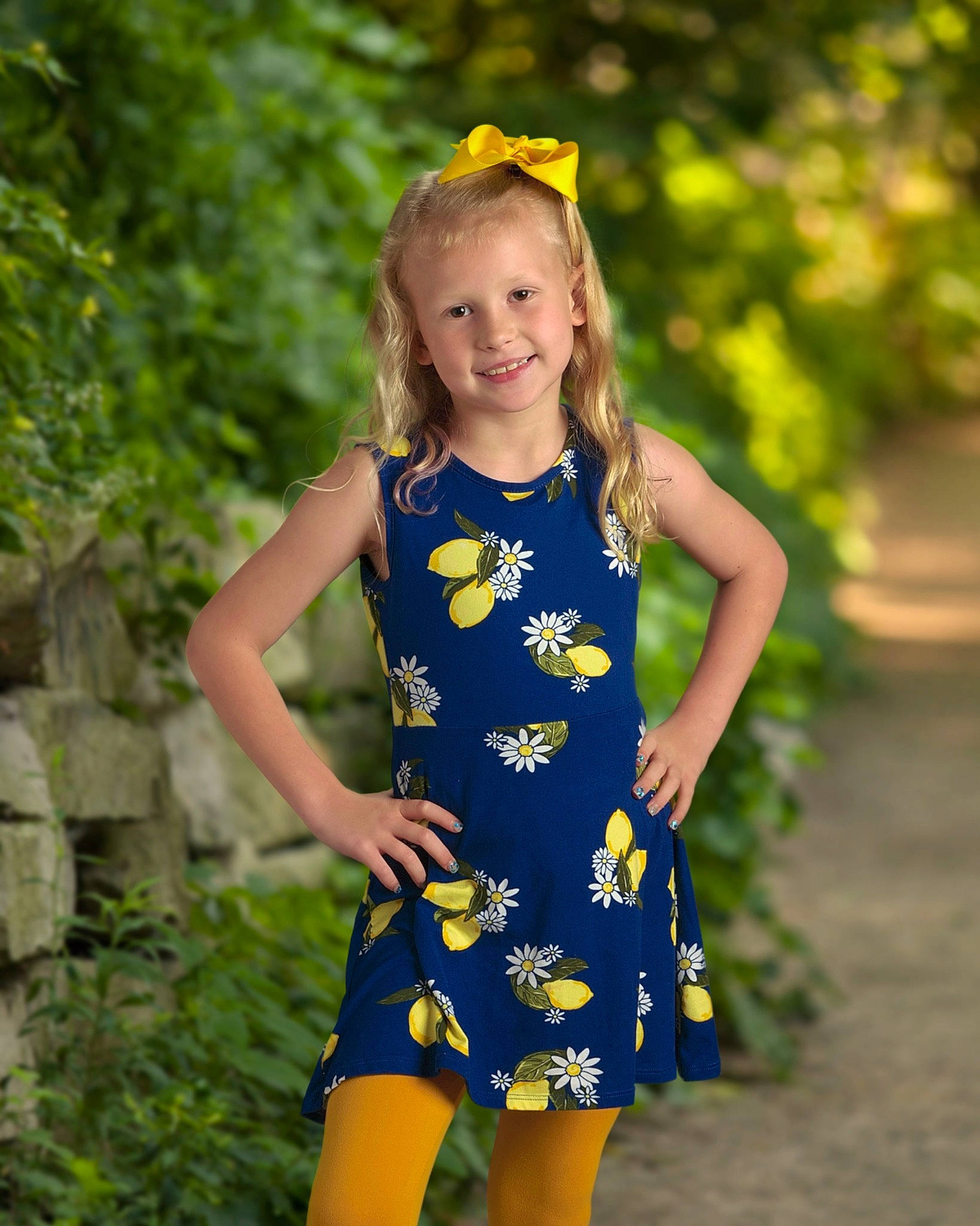 Denim joined the competition — help win amazing prizes! baby_toddler_clothing, blond, brown_hair, day_dress, dress, electric_blue, face, grass, hair, happy, joy, one_piece_garment, pattern, people_in_nature, person, plant, sleeve, smile, summer, toddler