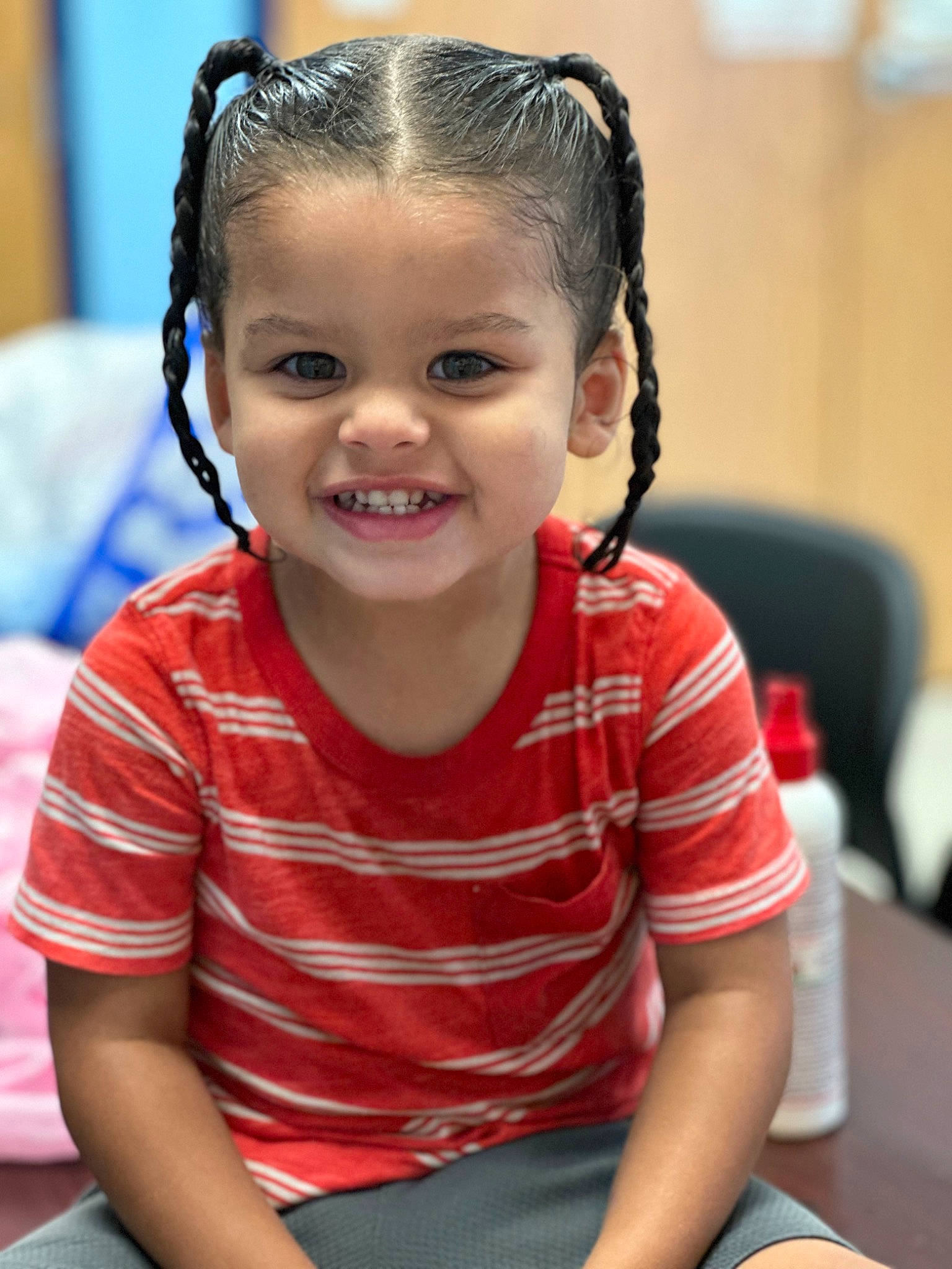 Kyrie is registered to the contest to win money with this photo: audio_equipment, cheek, child, chin, ear, eye, eyelash, forehead, fun, hair_tie, hairstyle, happy, headband, joy, leisure, nose, person, skin, smile, snapshot