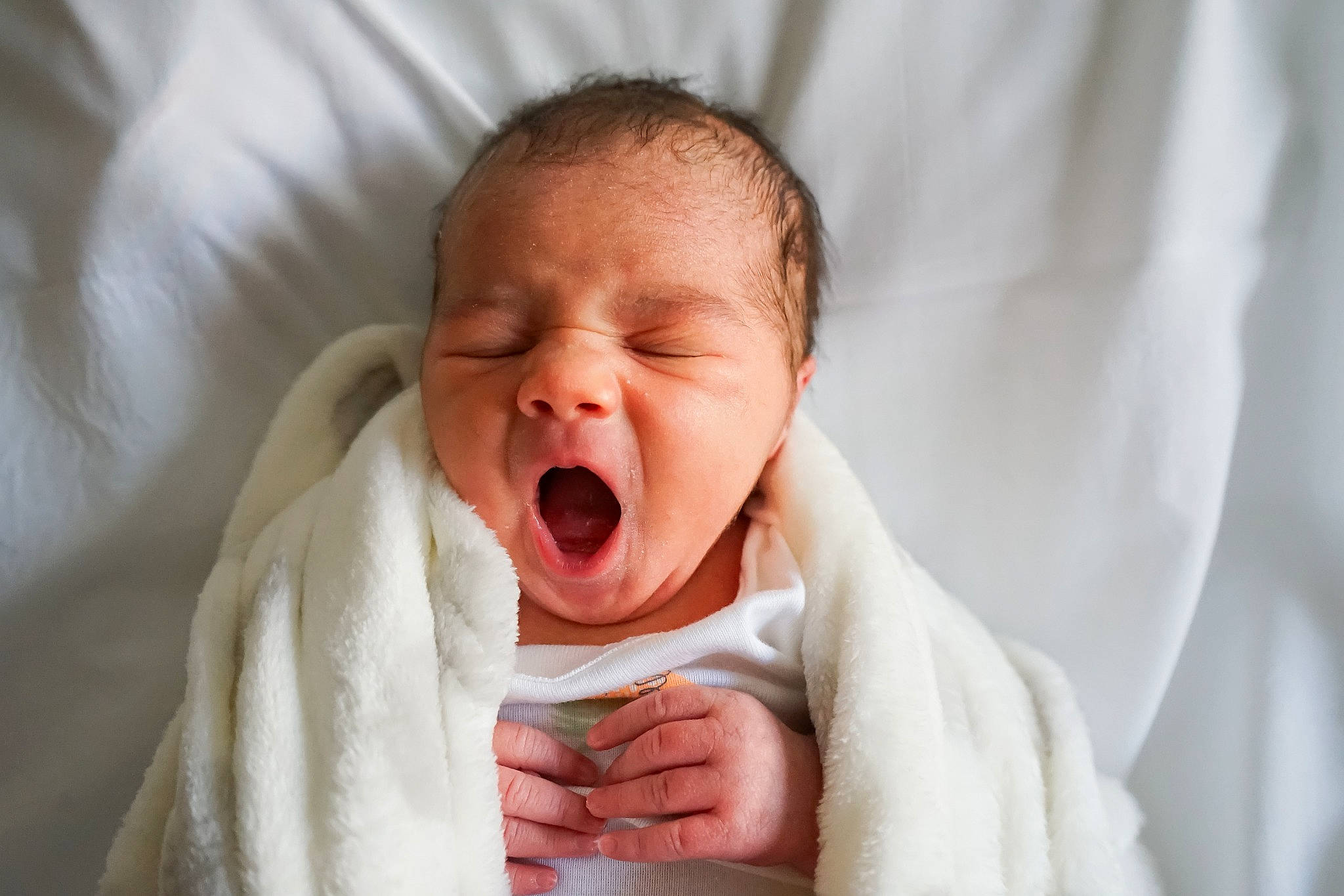 Elizabeth is registered to the contest to win money with this photo: baby, baby_toddler_clothing, cheek, child, comfort, event, eye, flesh, gesture, happy, laugh, linens, lip, peach, person, portrait_photography, sleeve, smile, thumb, toddler