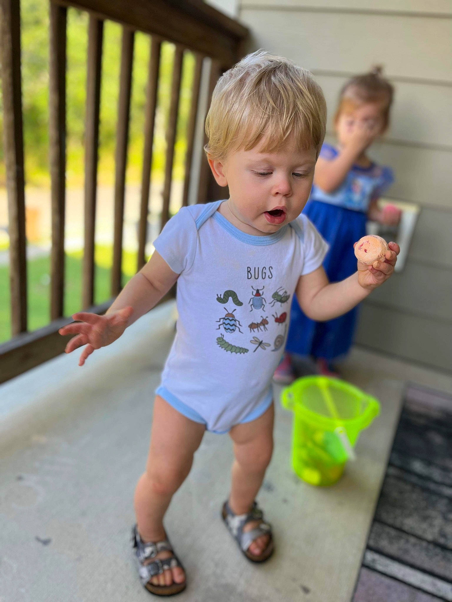 Beau joined the competition — help win amazing prizes! baby_toddler_clothing, blurred, bucket, child, electric_blue, fence, fun, grass, hairstyle, happy, household_cleaning_supply, human_leg, leisure, person, play, recreation, sandal, shorts, t_shirt, toddler