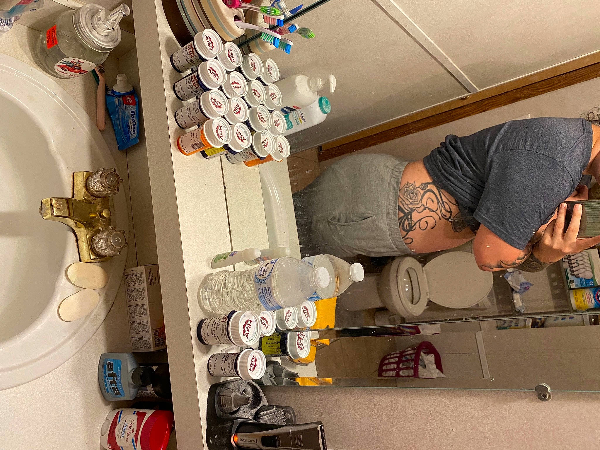 Meredith joined the competition — help win amazing prizes! bottle, ceramic, collection, person, porcelain, shelving, under_exposed