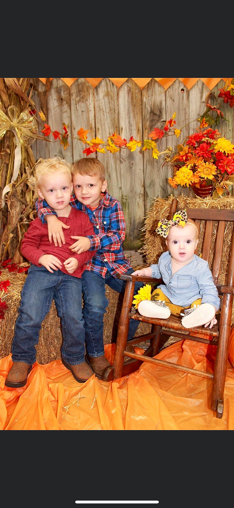 Meredith is registered to the contest to win money with this photo: baby, baby_toddler_clothing, bread, child, denim, eye, family, floral_design, home_fencing, human_body, joy, lap, leg, love, nose, person, playing_with_kids, sharing, sitting, sock