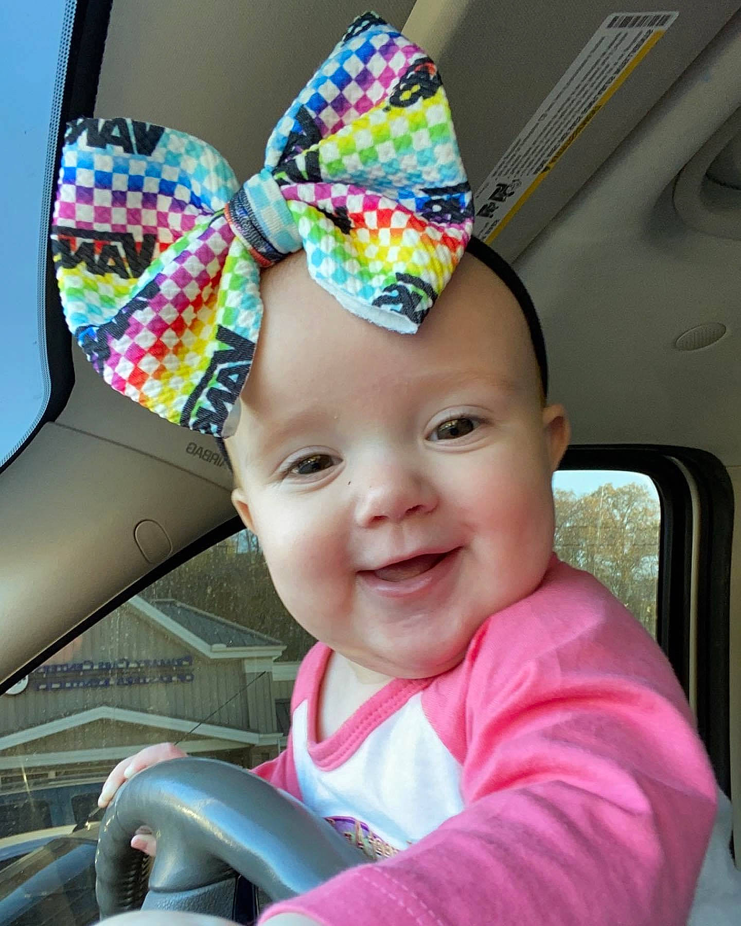 Meredith is registered to the contest to win money with this photo: automotive_window_part, baby, baby_products, baby_toddler_clothing, car_seat, car_seat_cover, cheek, child, cone, cool, costume_accessory, costume_hat, glass, hair_accessory, headwear, joy, magenta, party_hat, party_supply, person