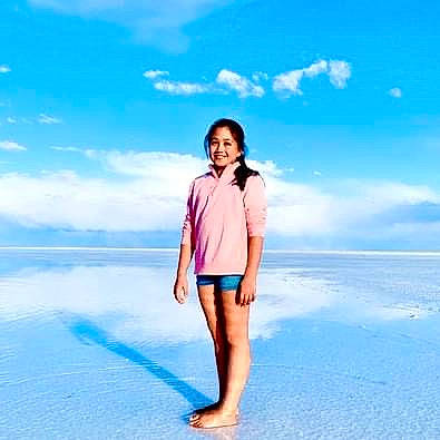 Gracie is registered to the contest to win money with this photo: azure, cloud, denim, fashion_design, fashion_model, flash_photography, happy, horizon, human_body, joy, knee, landscape, leg, people_in_nature, person, shirt, sky, sleeve, summer, thigh