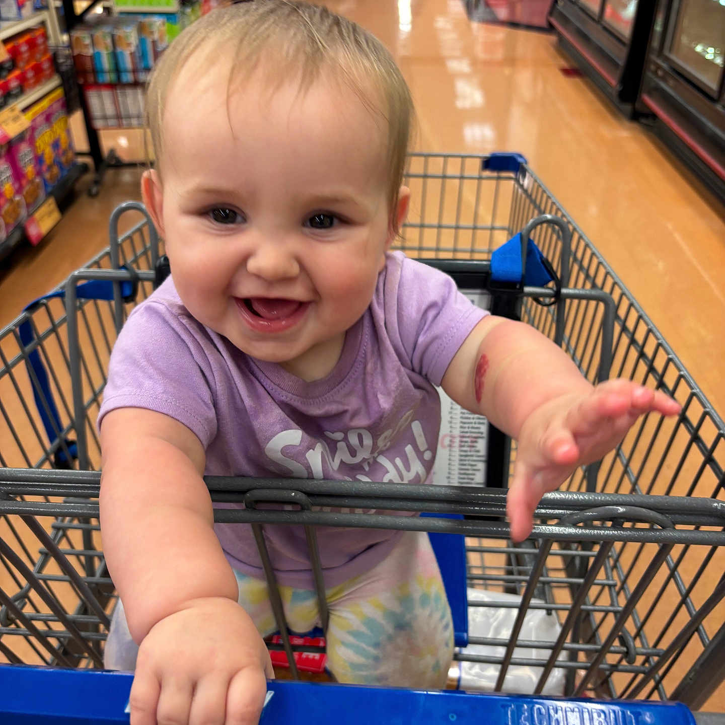Emberleigh joined the competition — help win amazing prizes! aisle, baby, casual, child, clothing, face, floor, grocery_store, hand, happy, indoor, person, product, retail, shelf, shopping_cart, smiling, store, toddler, toy
