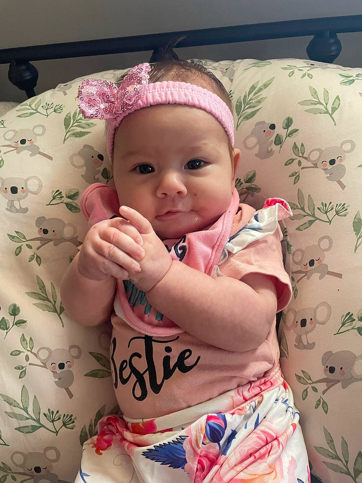 Martha is registered to the contest to win money with this photo: baby, baby_toddler_clothing, cheek, child, comfort, dress, eye, eyelash, facial_expression, finger, happy, headwear, linens, lip, person, pink, skin, sleeve, smile, t_shirt