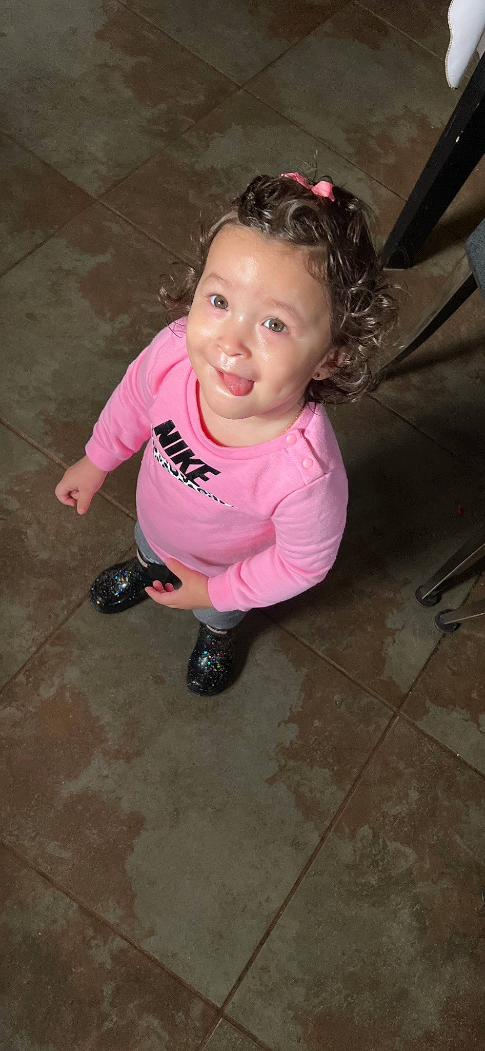 Jazlyn joined the competition — help win amazing prizes! baby_toddler_clothing, cheek, child, eyewear, flash_photography, floor, flooring, fun, happy, human_leg, magenta, person, pink, sandal, sitting, skin, smile, sneakers, sock, t_shirt
