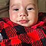 Jamiel joined the competition — help win amazing prizes! baby, face, child, infant, smile, blanket, red, black, checkered, closeup, portrait, skin, young, cute, cozy, warm, sleepwear, eyes, head, person
