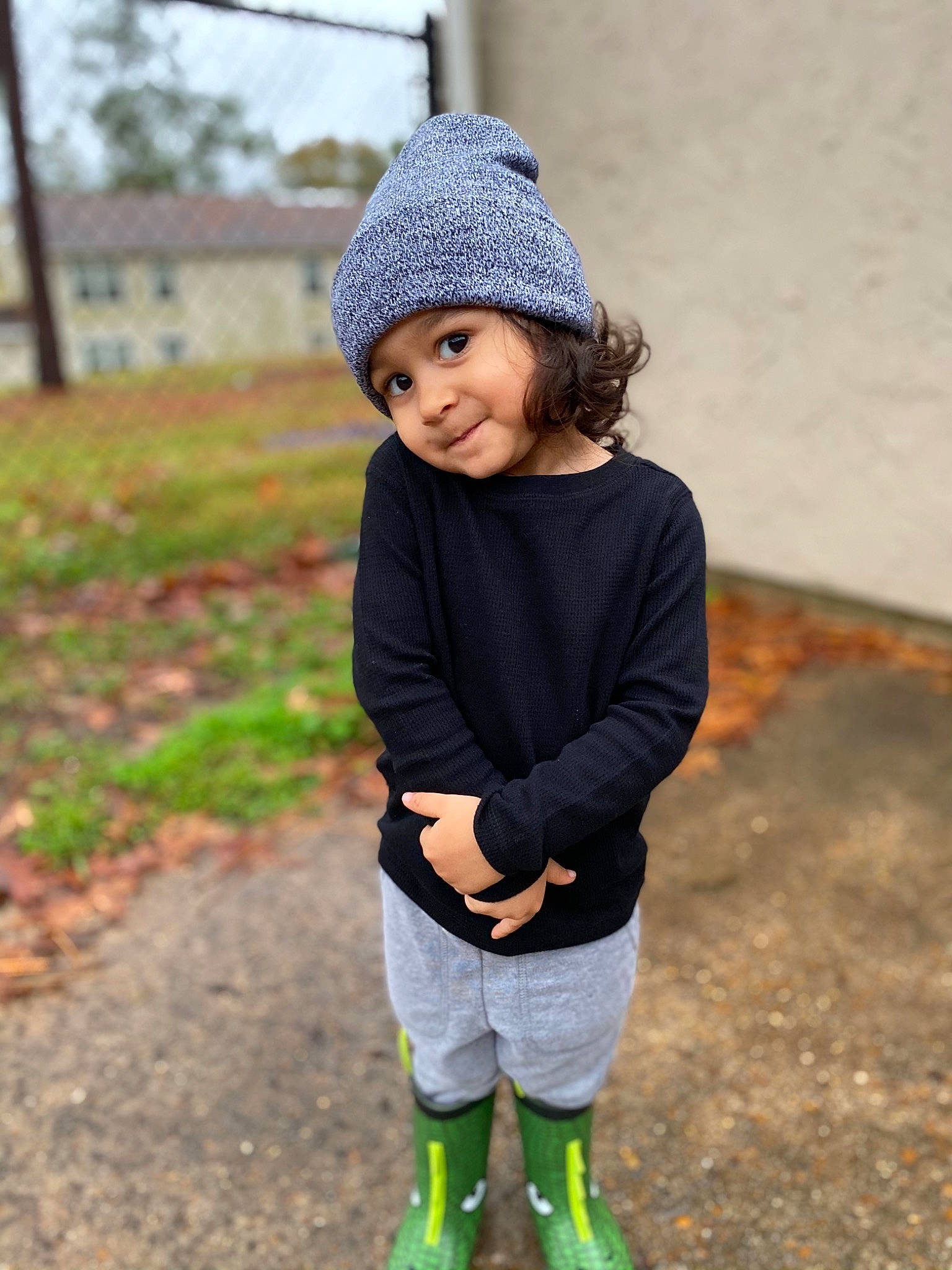 Jayden is registered to the contest to win money with this photo: beanie, bonnet, cap, child, child_model, clothing, fashion_accessory, footwear, hat, headgear, headwear, knit_cap, outerwear, pattern, person, play, shoe, sleeve, t_shirt, toddler