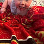 Loretta joined the competition — help win amazing prizes! baby, child, smiling, headband, bow, blanket, red_blanket, happy, face, infant, toddler, crawling, indoors, carpet, pattern, clothing, cute, person, portrait, expression