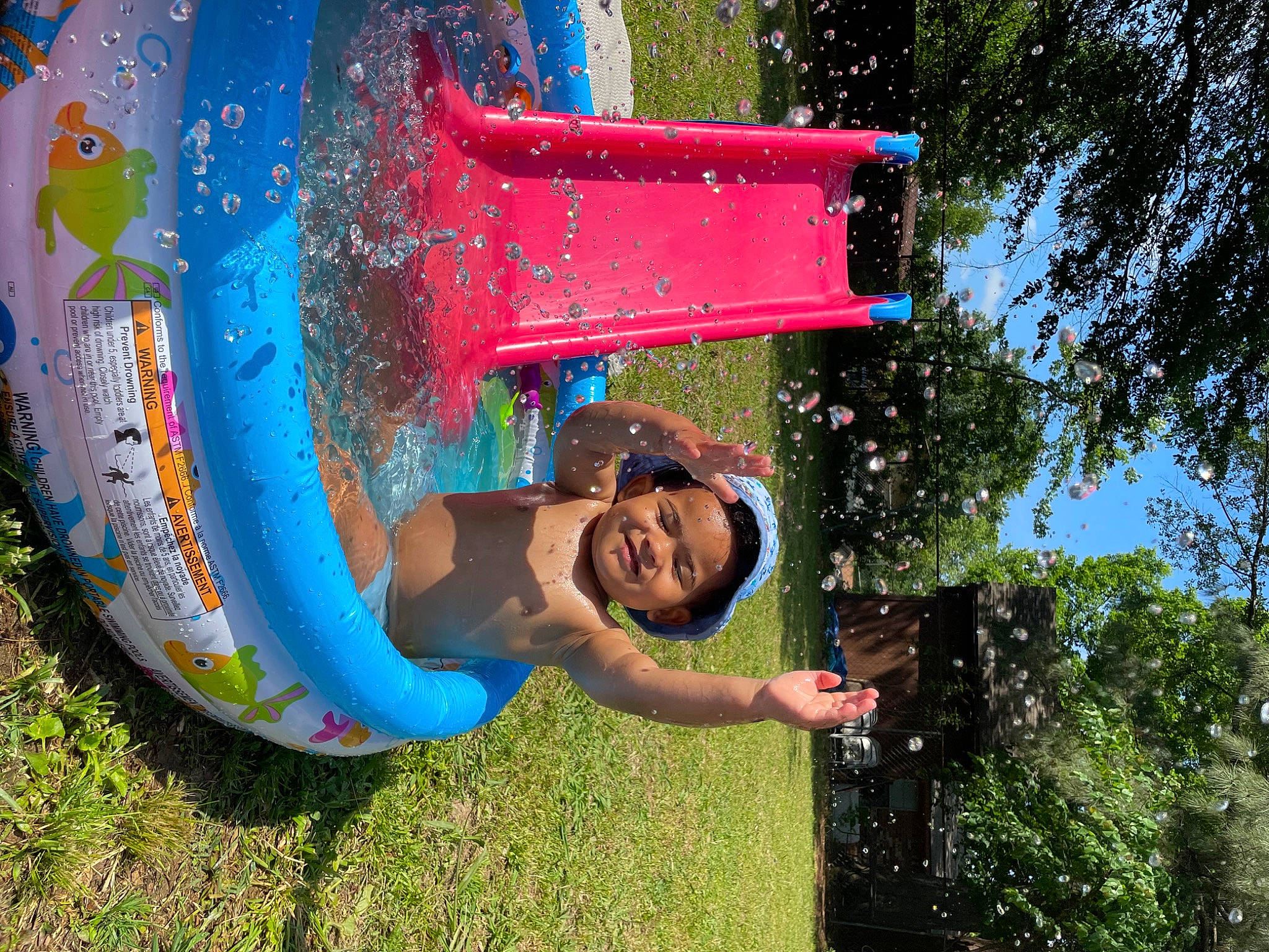 Kylo joined the competition — help win amazing prizes! automotive_wheel_system, child, chute, city, fun, grass, happy, joy, leisure, outdoor_play_equipment, people_in_nature, person, plant, play, playground, playground_slide, recreation, smile, toddler, tree