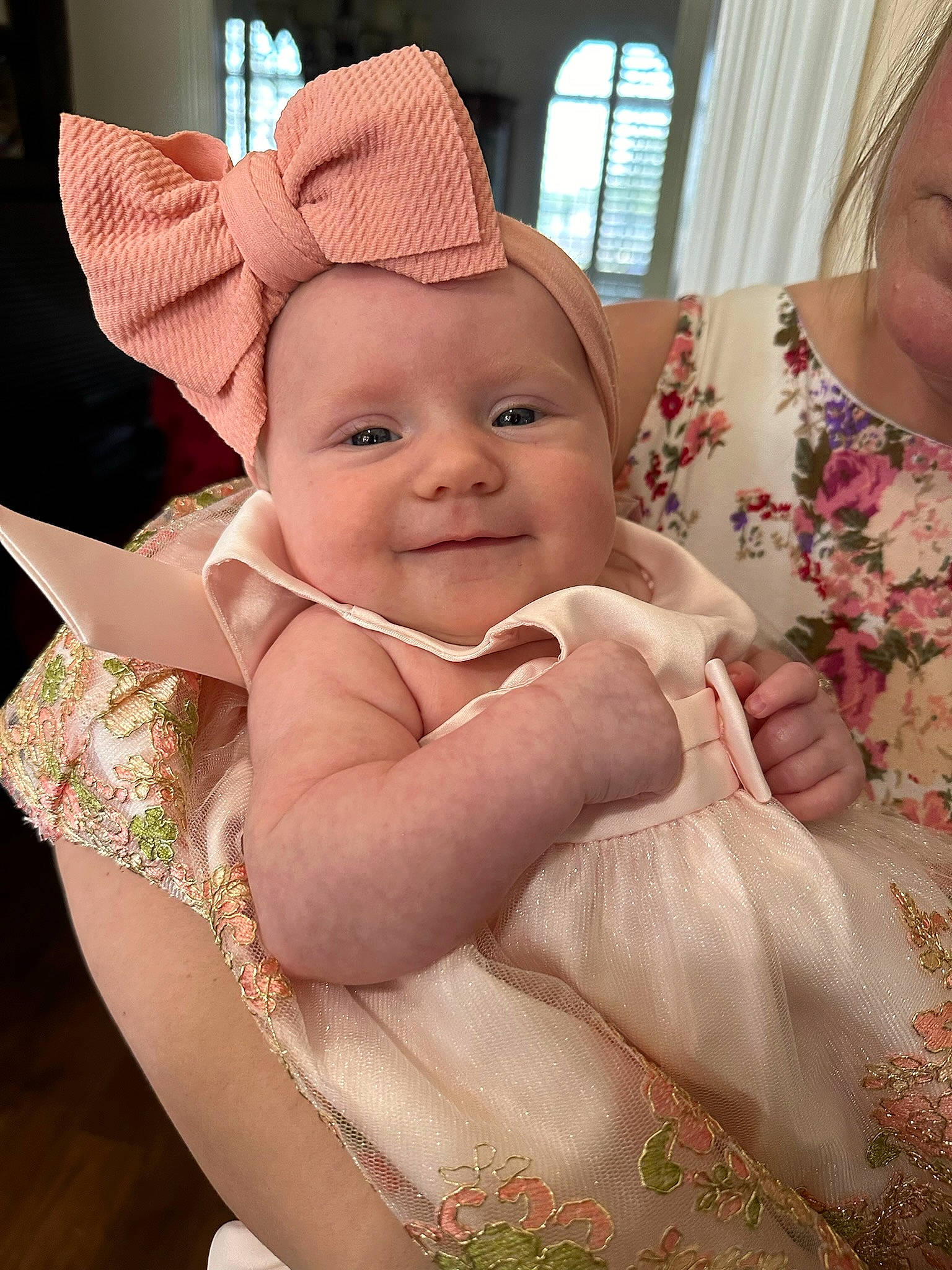 Chloe is registered to the contest to win money with this photo: abdomen, baby, cheek, chest, chin, facial_expression, finger, fun, gesture, happy, interaction, joy, lip, mouth, person, pink, skin, textile, thumb, toddler